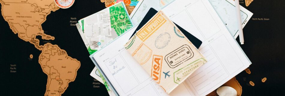 passport on top of a planner