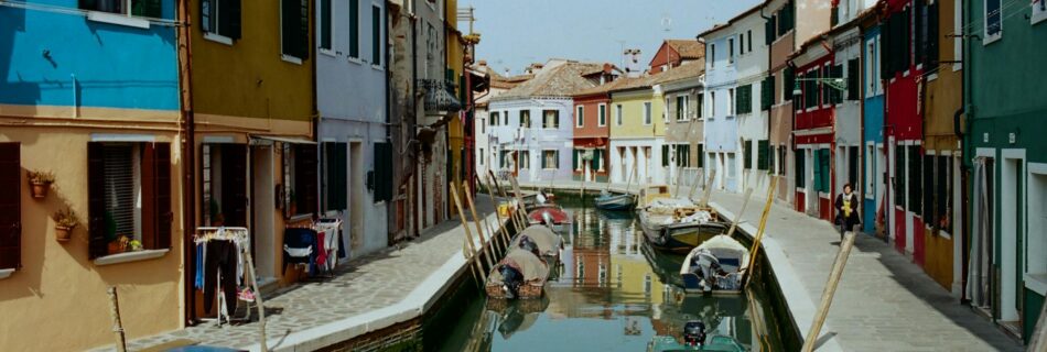 colorful houses along narrow town canal