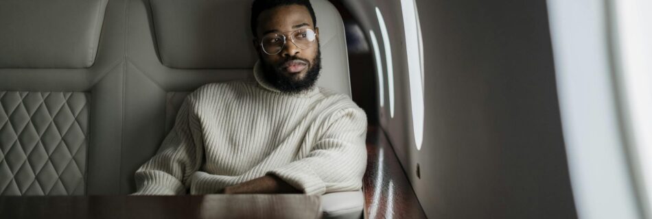 a man glancing out the airplane window