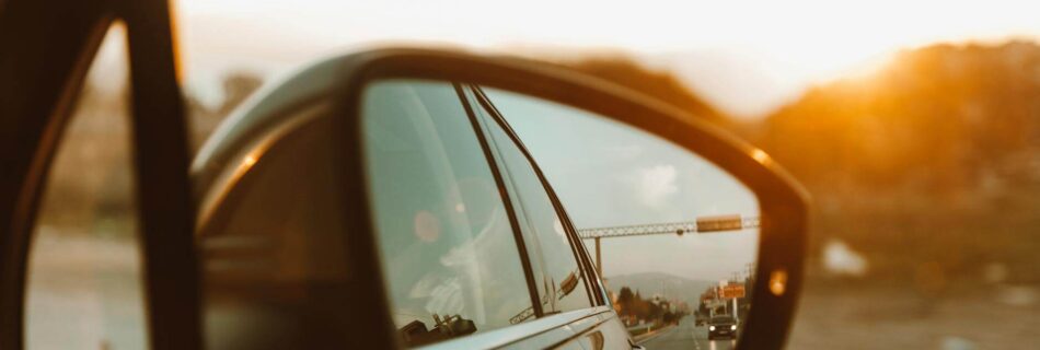 sunlight over car mirror