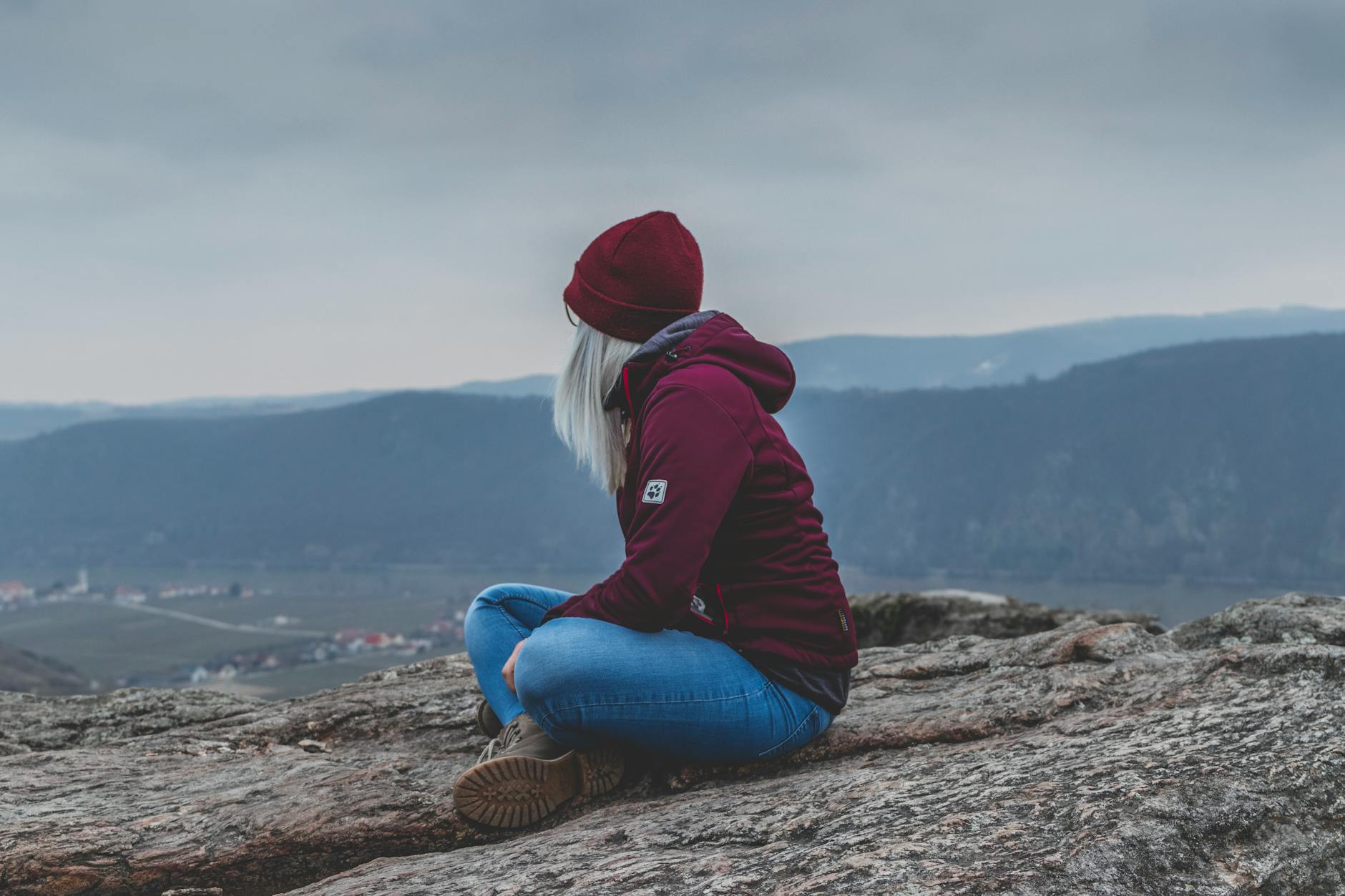 woman sitting on ground